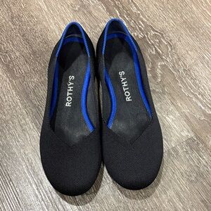 Rothy's Elegant Black Flats with Blue Trim